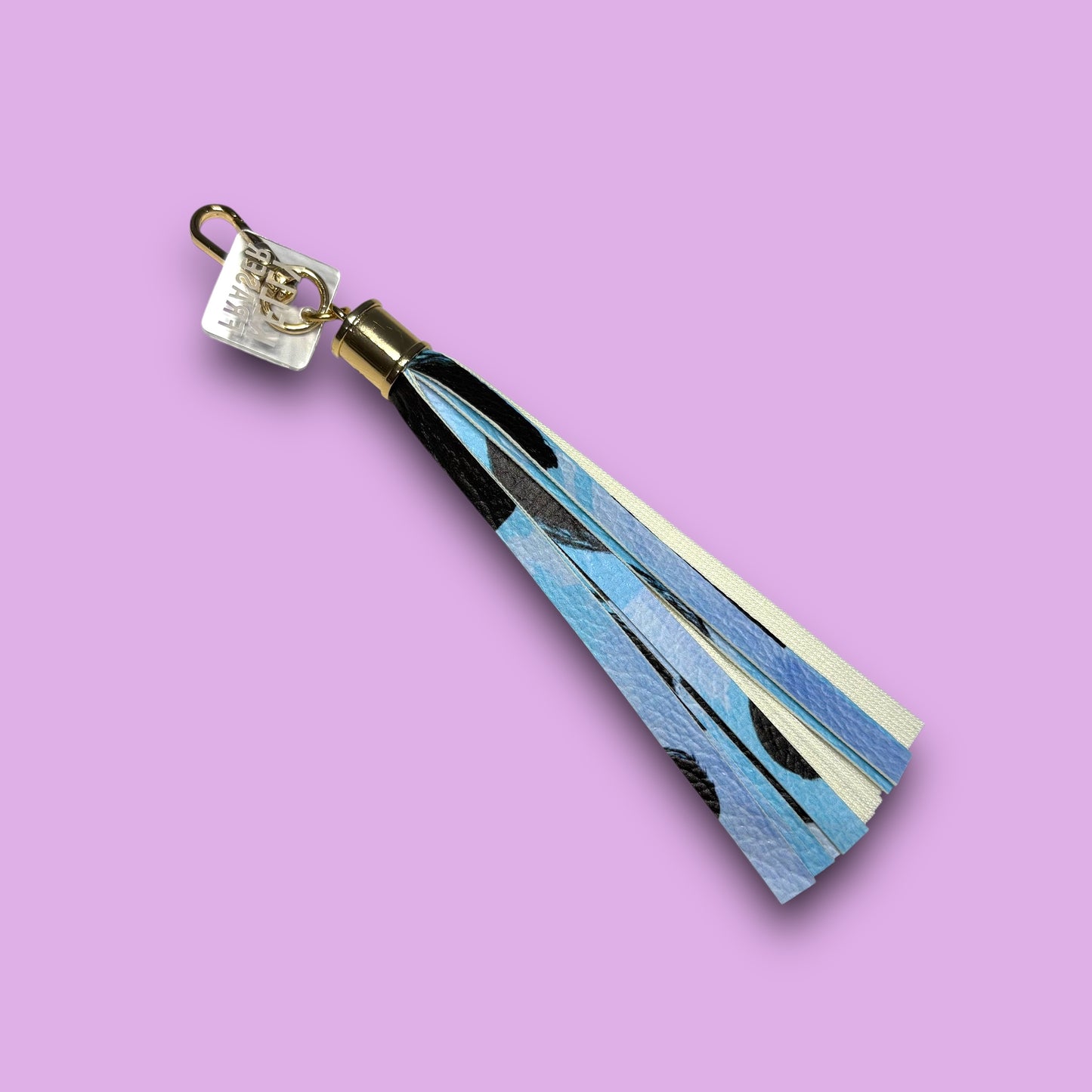 Clip Tassel Blue Cheetah Gold